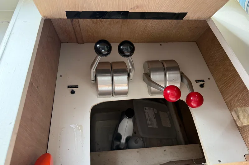 La Vie Dansante Yacht Photos Pics Control panel of a 1991 Californian 55 Cockpit Motor Yacht with throttle levers.