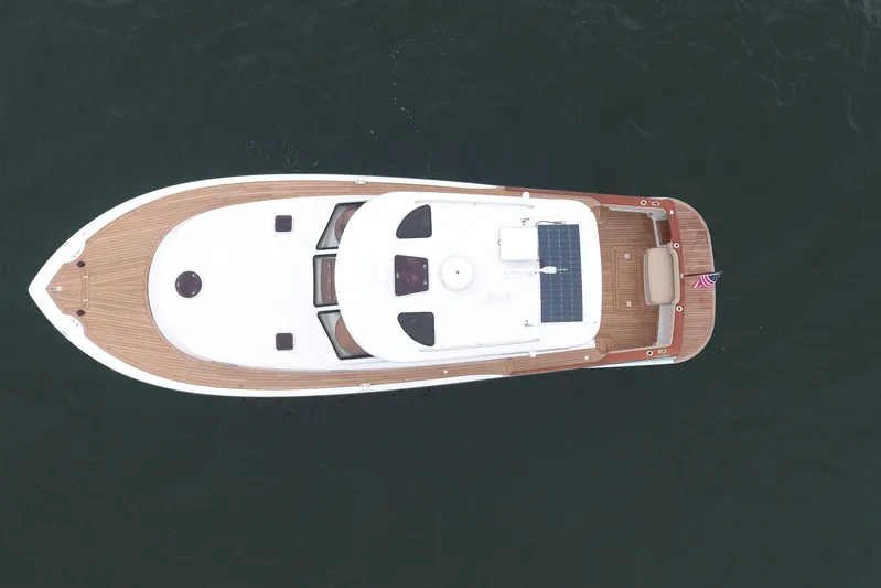 Mango Tango Yacht Photos Pics Overhead view of 2014 San Juan 41 yacht on calm water.