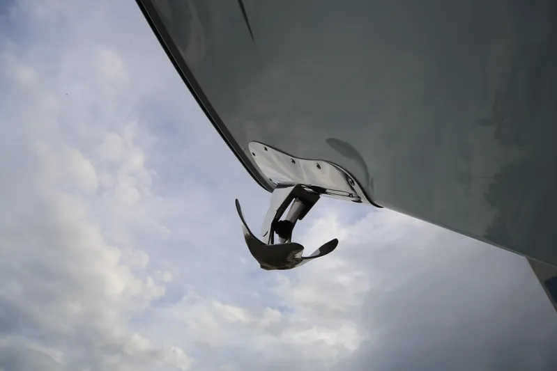 Mango Tango Yacht Photos Pics San Juan 41 boat anchor against cloudy sky, 2014 model.