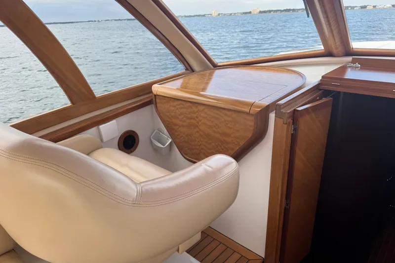 Mango Tango Yacht Photos Pics Luxurious interior of 2014 San Juan 41 yacht with leather seating and wooden accents.