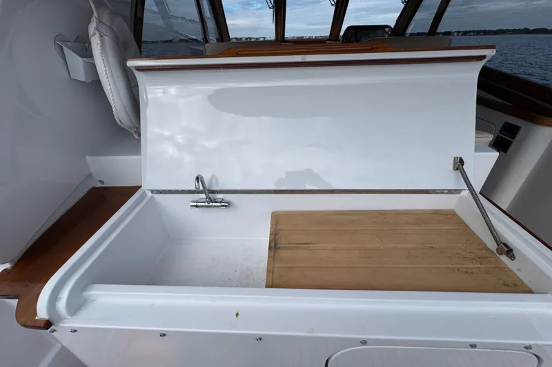 Mango Tango Yacht Photos Pics San Juan 41 yacht interior sink area with wooden accents, 2014 model.