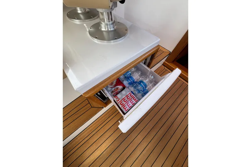 Mango Tango Yacht Photos Pics Open drawer on San Juan 41 yacht with water bottles and snacks, 2014 model.