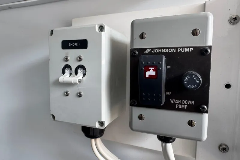 Mango Tango Yacht Photos Pics Electrical panel with Johnson Pump controls on a 2014 San Juan 41 boat.