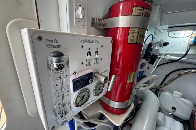 Mango Tango Yacht Photos Pics Control panel and fire extinguisher in 2014 San Juan 41 boat engine room.