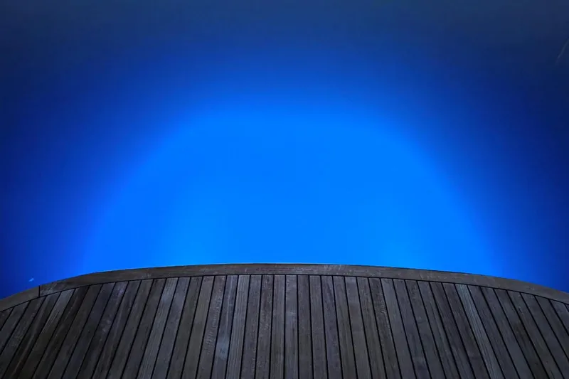 Mango Tango Yacht Photos Pics Wooden deck of 2014 San Juan 41 yacht against deep blue water.