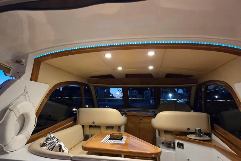 Mango Tango Yacht Photos Pics Luxurious interior of 2014 San Juan 41 yacht with elegant seating and ambient lighting.