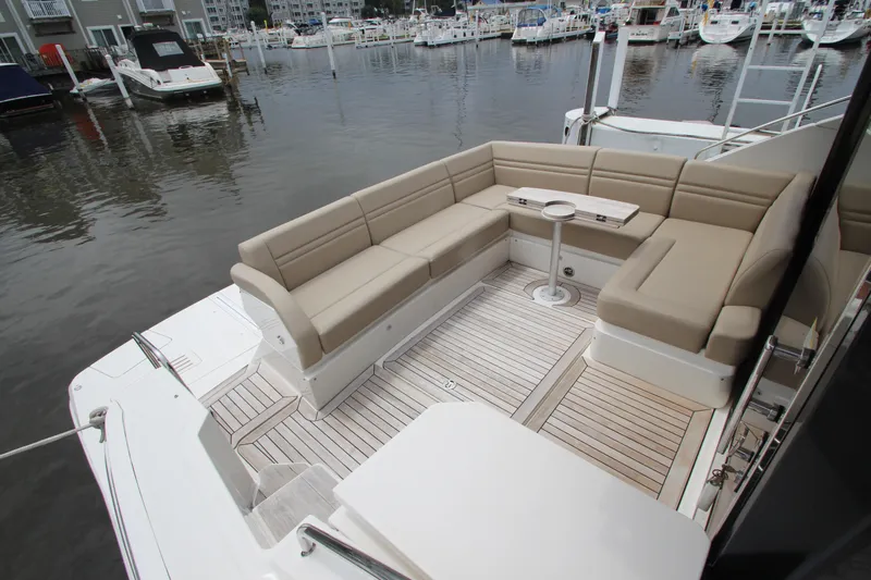  Yacht Photos Pics Luxurious seating area on 2016 Sea Ray 510 Sundancer yacht, docked at marina.