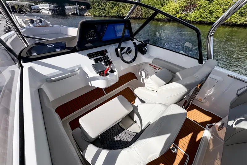  Yacht Photos Pics Modern STERK 31 boat interior, 2025 model, featuring sleek design and advanced navigation controls.