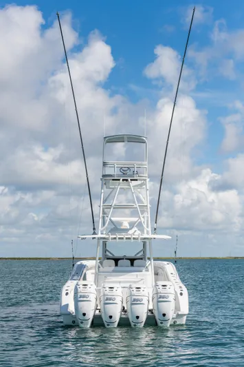  Yacht Photos Pics 2019 Yellowfin 42 Center Console boat with multiple outboard engines on open water.