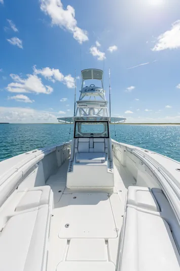  Yacht Photos Pics 2019 Yellowfin 42 Center Console boat on open water under blue sky.