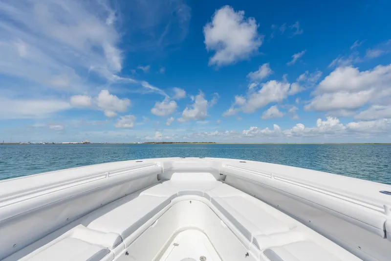  Yacht Photos Pics 2019 Yellowfin 42 Center Console boat on open water under blue sky.