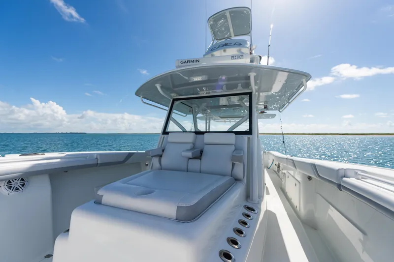  Yacht Photos Pics 2019 Yellowfin 42 Center Console boat on open water under clear blue sky.