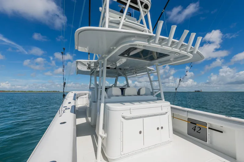  Yacht Photos Pics 2019 Yellowfin 42 Center Console boat on open water under blue sky.