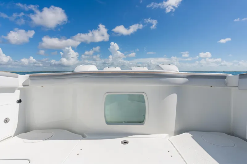  Yacht Photos Pics 2019 Yellowfin 42 Center Console boat deck under clear blue sky.