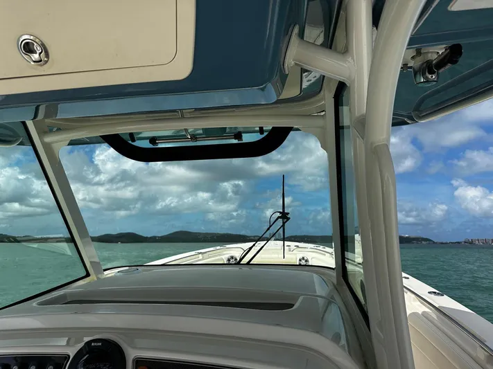  Yacht Photos Pics View from a 2021 Grady-White Canyon 336 boat, overlooking the ocean and distant hills.
