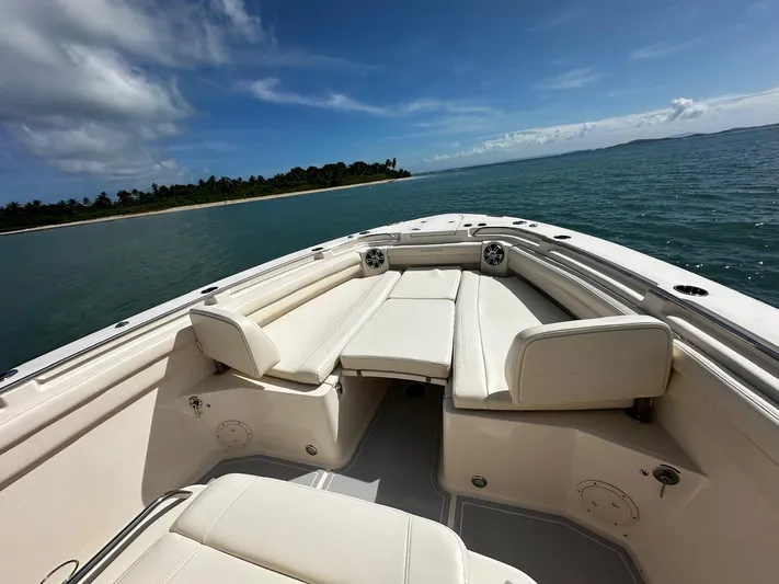  Yacht Photos Pics 2021 Grady-White Canyon 336 boat interior with ocean view and island in background.