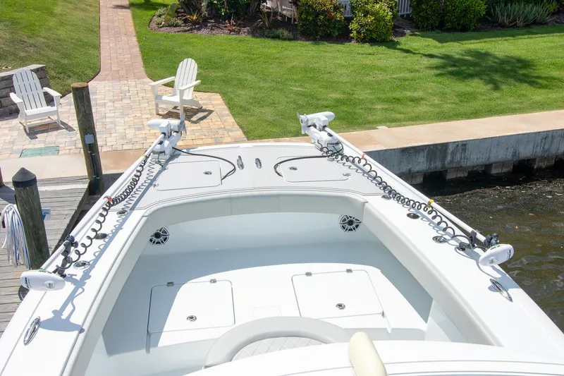  Yacht Photos Pics 2022 Freeman 37 VH boat docked near a grassy area with chairs.