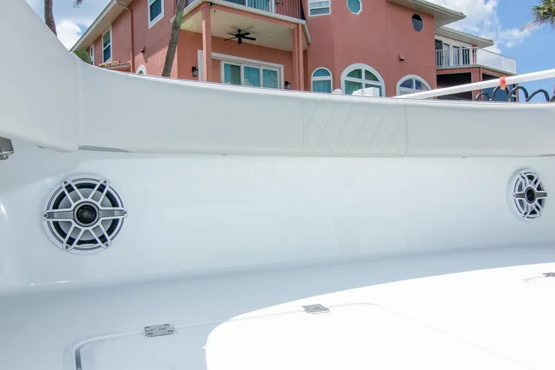  Yacht Photos Pics 2022 Freeman 37 VH boat interior with speakers, near a pink house.