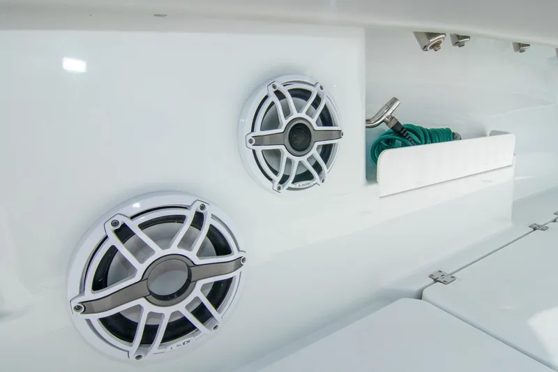  Yacht Photos Pics 2022 Freeman 37 VH boat speakers and hose storage on deck.