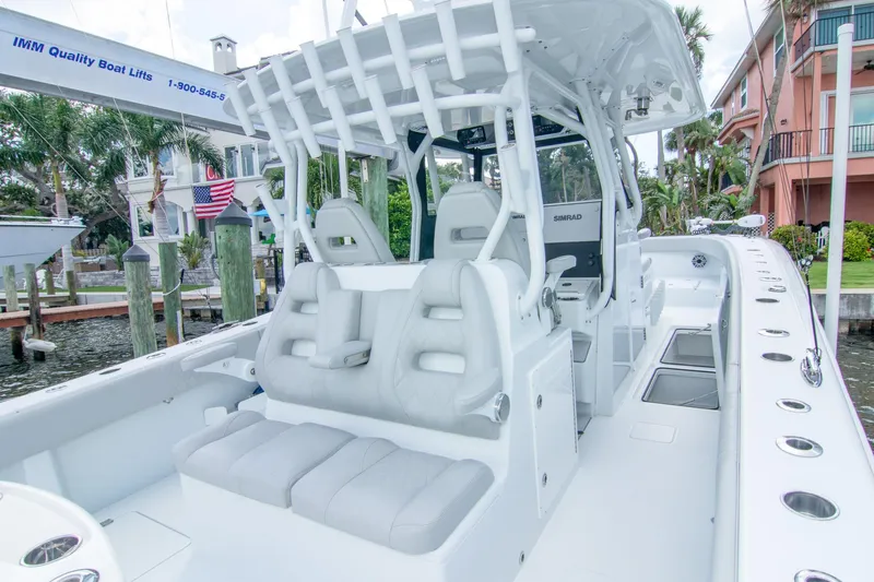  Yacht Photos Pics 2022 Freeman 37 VH boat interior with white seating and modern design.