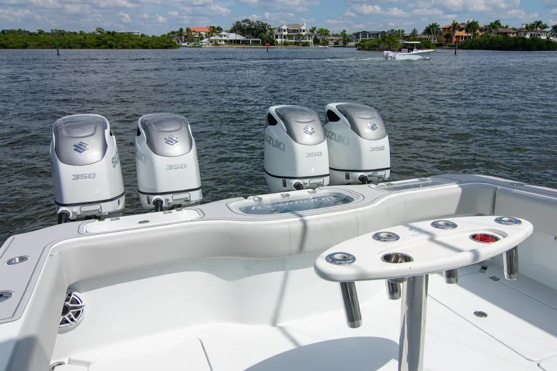  Yacht Photos Pics 2022 Freeman 37 VH boat with four Suzuki 350 engines on a scenic waterway.