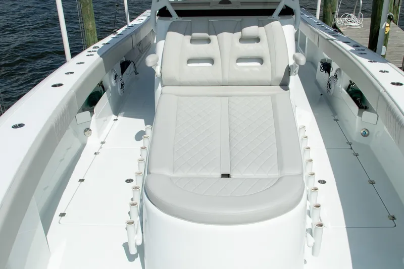  Yacht Photos Pics Luxury seating on a 2022 Freeman 37 VH boat, featuring elegant white upholstery.