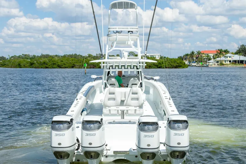  Yacht Photos Pics 2022 Freeman 37 VH boat with four Suzuki 350 engines on a sunny day.