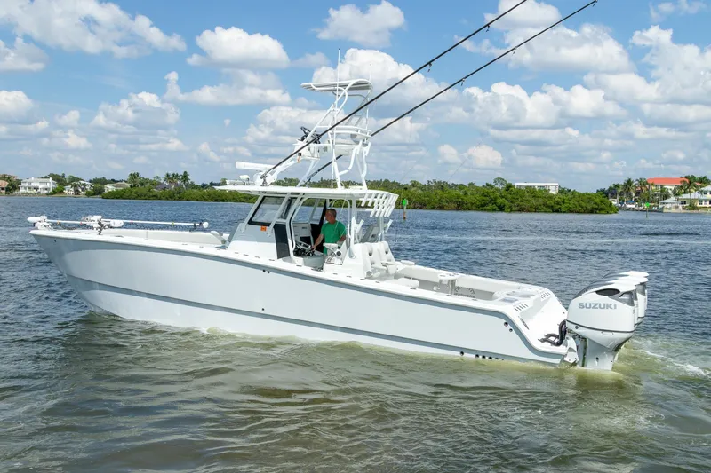  Yacht Photos Pics 2022 Freeman 37 VH boat cruising on a sunny day with Suzuki engines.