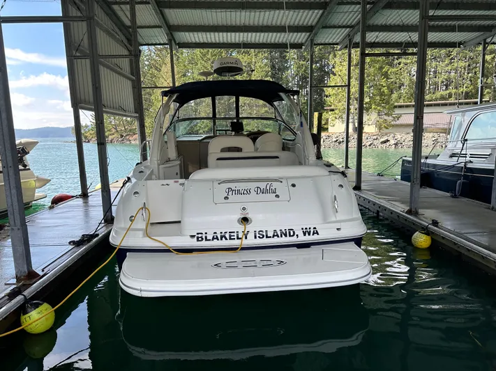  Yacht Photos Pics 2004 Sea Ray 360 Sundancer docked at Blakely Island, WA, under a covered marina.
