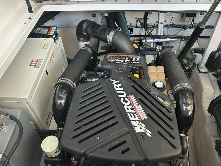  Yacht Photos Pics Engine compartment of a 2004 Sea Ray 360 Sundancer with Mercury components.