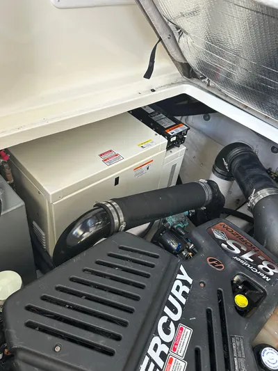  Yacht Photos Pics Engine compartment of a 2004 Sea Ray 360 Sundancer with Mercury components.