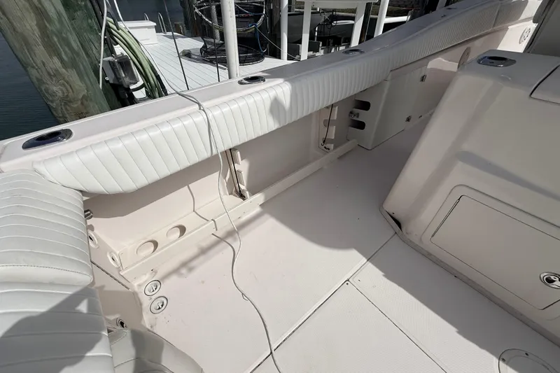  Yacht Photos Pics 2013 Grady-White Canyon 306 boat interior with white seating and deck details.