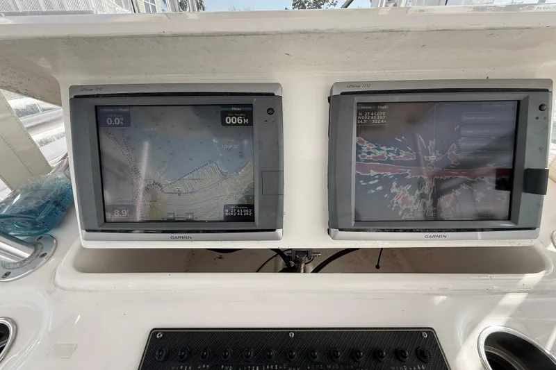  Yacht Photos Pics 2013 Grady-White Canyon 306 boat with dual Garmin navigation displays.