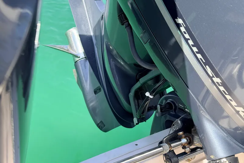  Yacht Photos Pics 2013 Grady-White Canyon 306 boat engine in turquoise water.