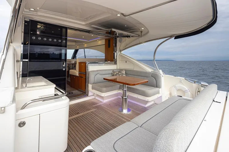 Lucky Dog Yacht Photos Pics Luxurious 2018 Riviera 4800 Sport Yacht with elegant interior and ocean view.