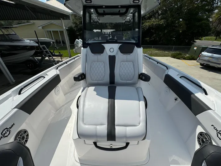  Yacht Photos Pics 2024 Fountain 32 NX boat interior with luxurious seating and modern design.