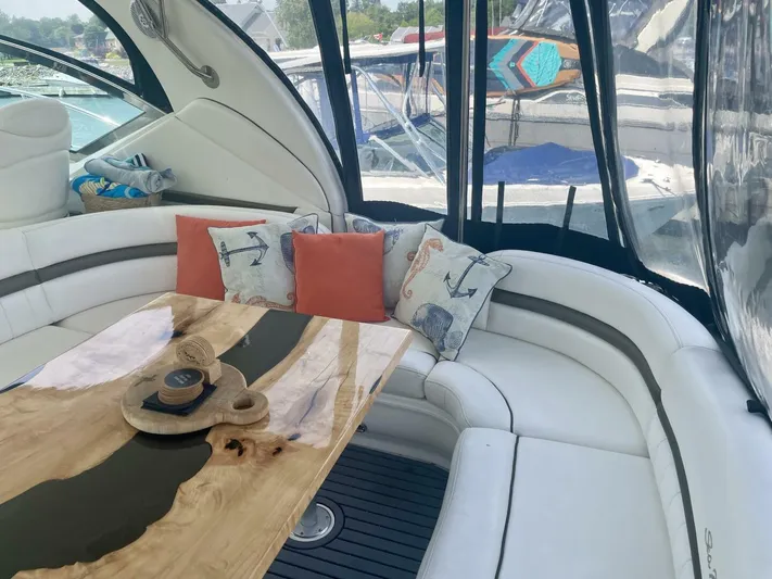  Yacht Photos Pics Luxurious 2006 Sea Ray 44 Sundancer yacht interior with elegant seating and nautical-themed decor.