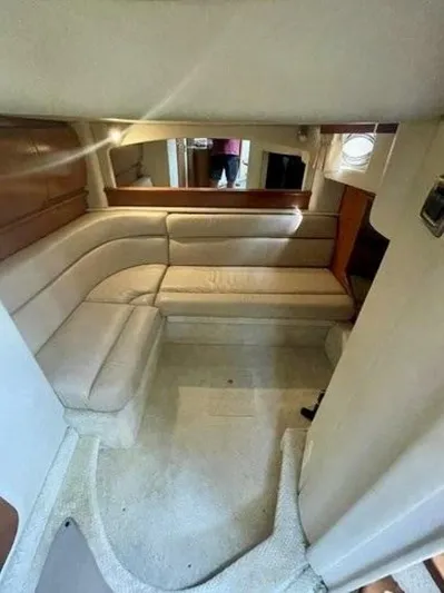  Yacht Photos Pics Interior of 2006 Sea Ray 44 Sundancer yacht with beige seating and wood accents.