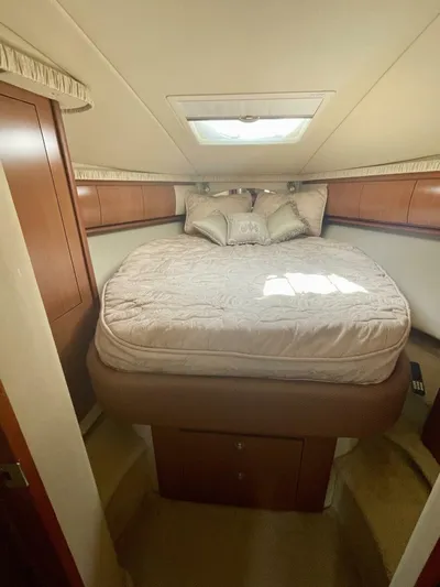  Yacht Photos Pics Luxurious cabin interior of 2006 Sea Ray 44 Sundancer yacht with cozy bed.