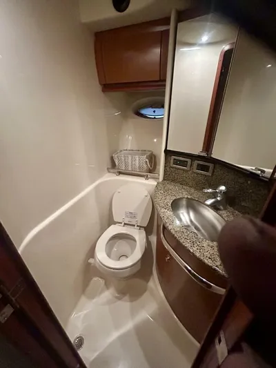  Yacht Photos Pics Bathroom interior of 2006 Sea Ray 44 Sundancer yacht with toilet and sink.