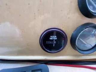 Clarity Yacht Photos Pics Hour meter on 1995 Navigator 50 dashboard, displaying usage hours.