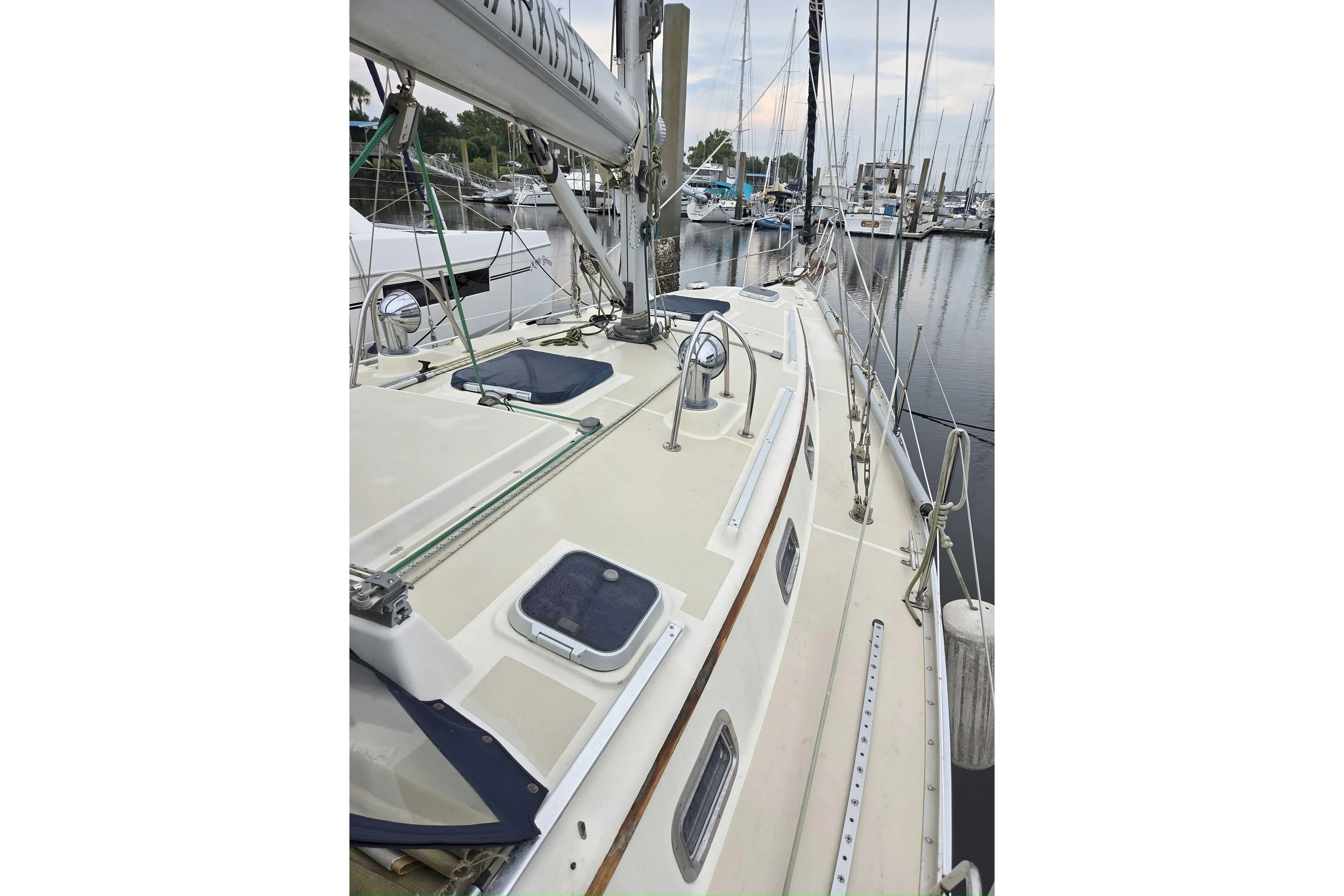 2001 Caliber 40LRC sailboat deck view in marina setting.
