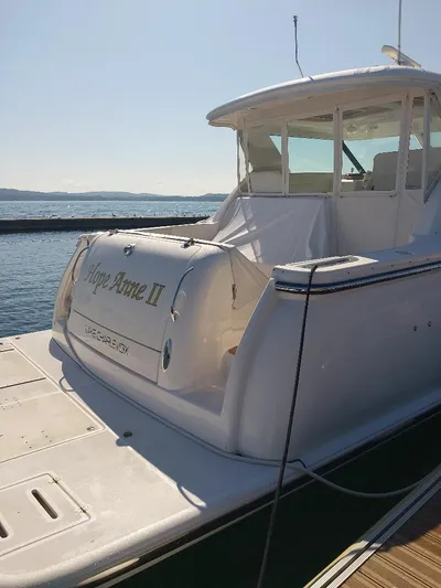 Hope Anne II Yacht Photos Pics 2003 Tiara Yachts 4400 Sovran docked, rear view, sunny day, calm waters.