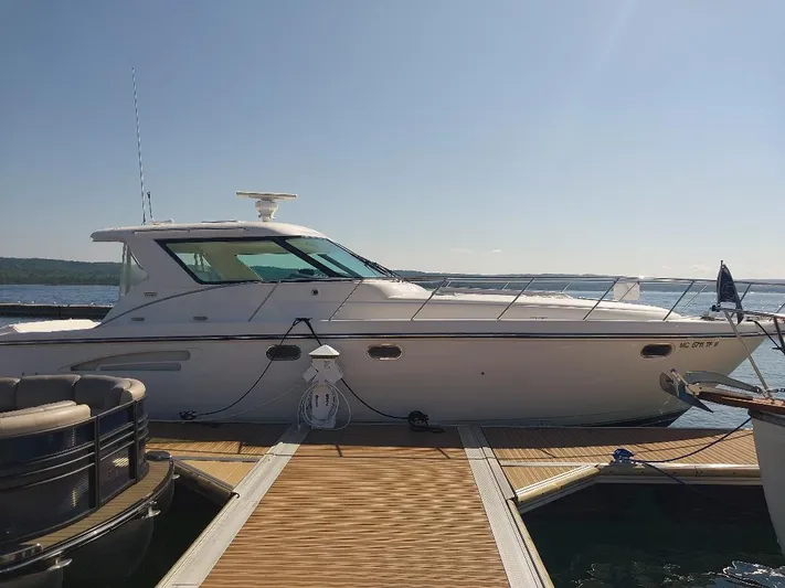 Hope Anne II Yacht Photos Pics 2003 Tiara Yachts 4400 Sovran docked on a sunny day.