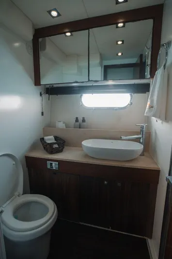  Yacht Photos Pics Luxurious bathroom in 2010 Sunseeker Predator 60 yacht with modern fixtures.