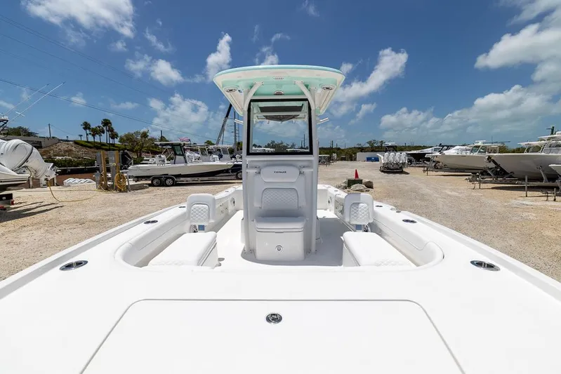  Yacht Photos Pics 2025 Caymas 281 HB boat on display under a clear blue sky.