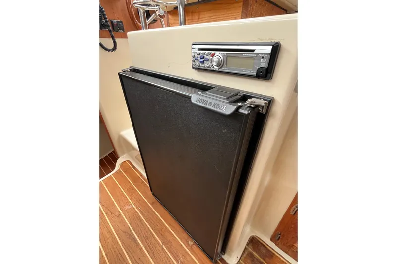 Rockin' Robin Yacht Photos Pics 2009 Ranger Tugs R-29 interior with Nova Kool fridge and Clarion stereo system.