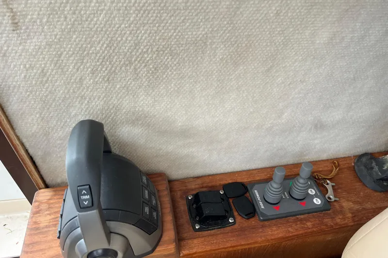 Rockin' Robin Yacht Photos Pics 2009 Ranger Tugs R-29 control panel with throttle and joystick controls.