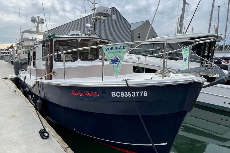 Rockin' Robin Yacht Photos Pics 2009 Ranger Tugs R-29 boat for sale at marina dock.