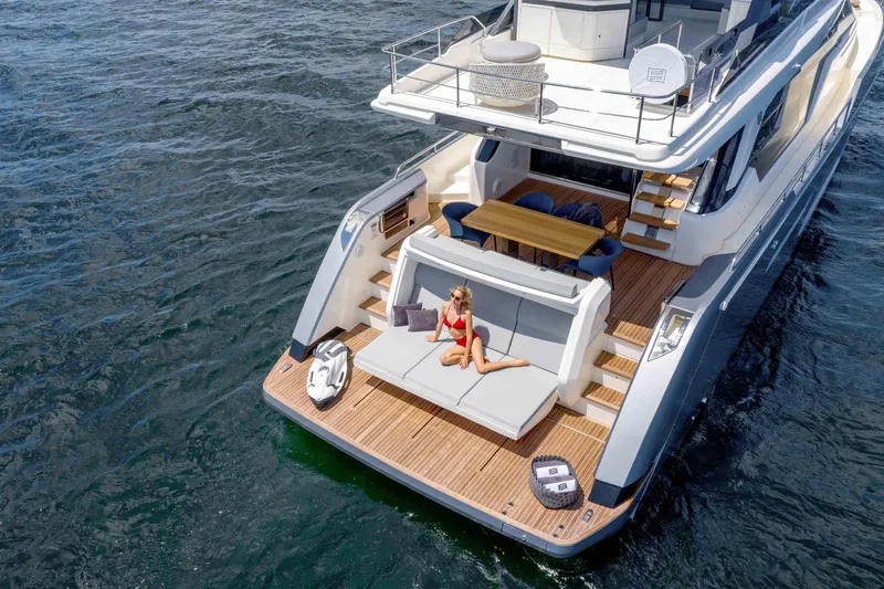  Yacht Photos Pics Luxury Ferretti Yachts 720, 2025 model, with sunbathing area on open deck.